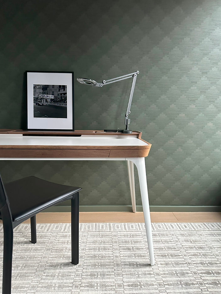 Zak+Fox green wallpaper, a modern desk, and a neutral Room & Board rug in a kids' bedroom showcasing NYC interior design by Sarah Scales.