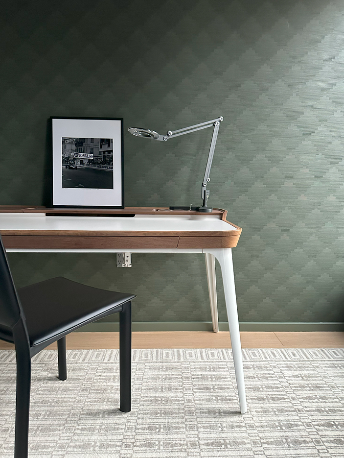 Zak+Fox green wallpaper, a modern desk, and a neutral Room & Board rug in a kids' bedroom showcasing NYC interior design by Sarah Scales.