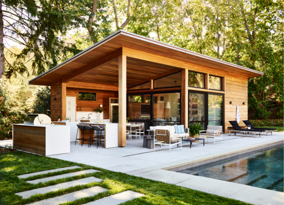 Modern pool house in Hingham by architect Estes Twombly + Titrington, with interiors by Sarah Scales Design Studio. Featured in New England Home Magazine.