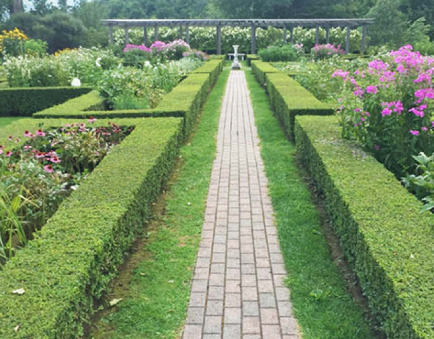 A classic English garden at the Hildene Estate, with summer’s bounty on display, inspiring timeless New England design for a Boston interior designer.