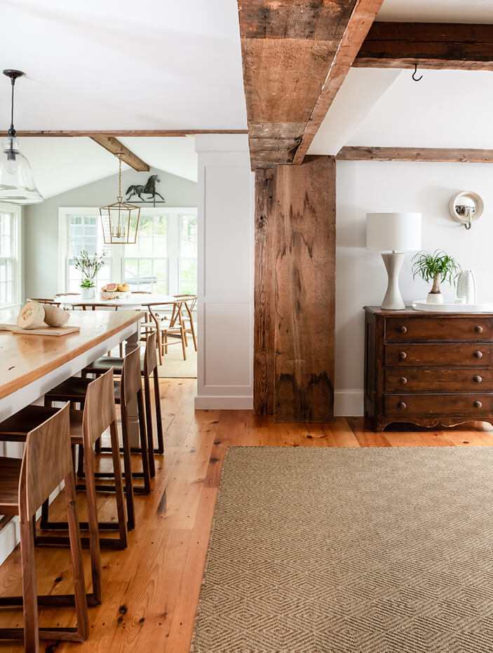 A vintage dresser in a historic Hingham home interior design project. Designed by a decorator who incorporates vintage furniture.