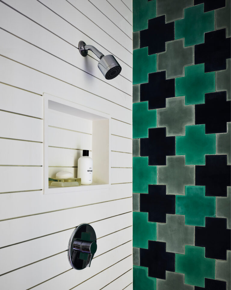 Kid-friendly bathroom with custom concrete tiles from Popham Tile in a new construction pool house by Boston interior designers.