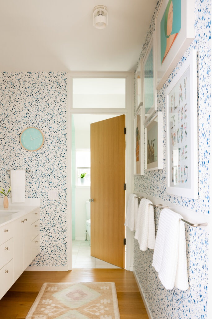 Modern kid-friendly bathroom in a new construction home in Hingham, designed by a Boston interior design firm.