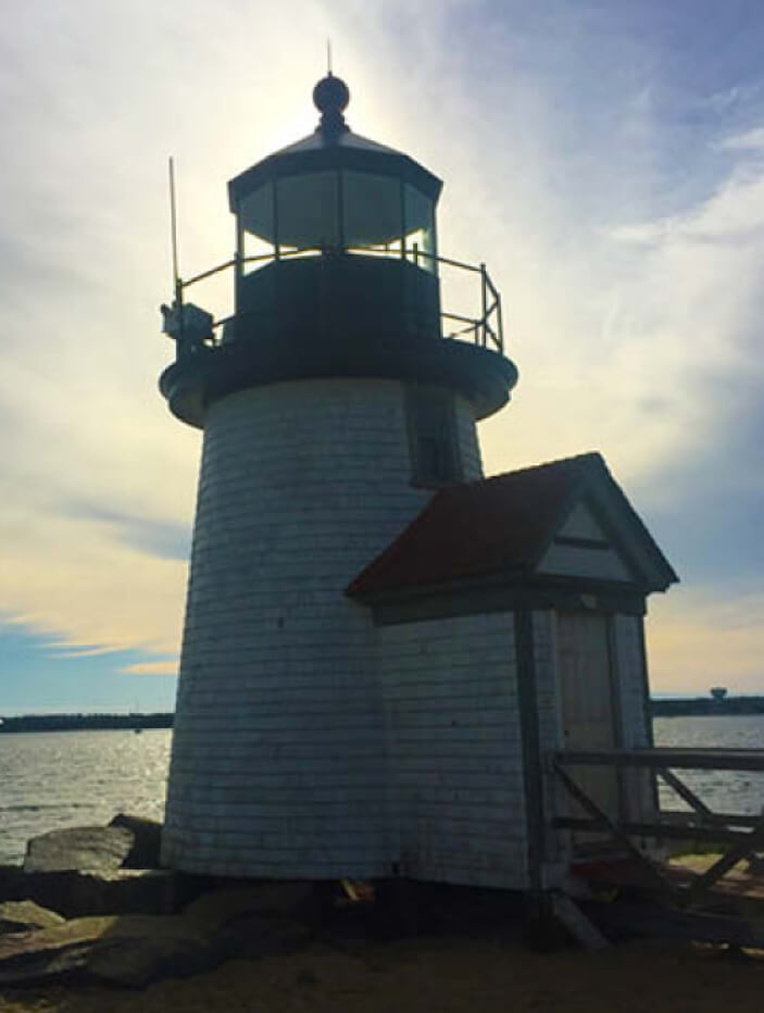 Brant Point Lighthouse in Nantucket—travel and landscape inspiration for Cape Cod interiors.