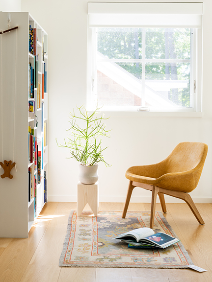 A warm corridor in a new construction home, painted Benjamin Moore White Dove (OC-17), a top choice for the best white paint colors.