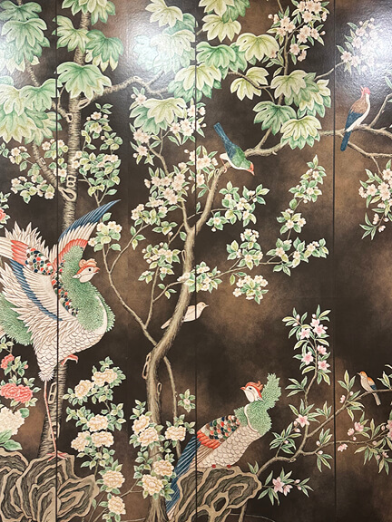 LA interior design showrooms include Gracie’s brown floral wallpaper with hand-painted detail showcased in their Los Angeles space