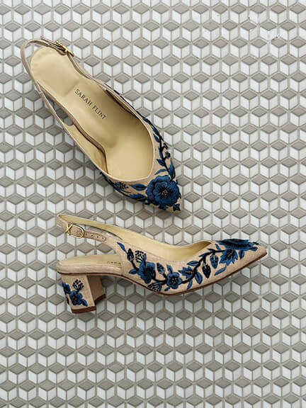 Sarah Flint shoe review highlighting the Perfect Emma Sling 50 in navy floral linen with detailed blue floral embroidery.