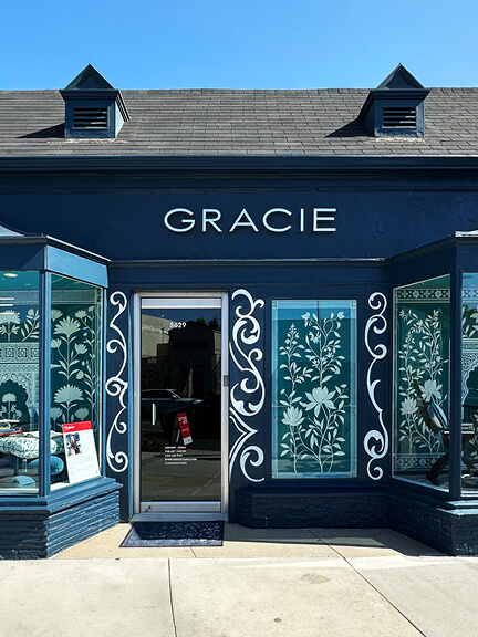 LA interior design showrooms feature hand-painted walls in the Gracie showroom in Los Angeles with traditional floral wallpaper