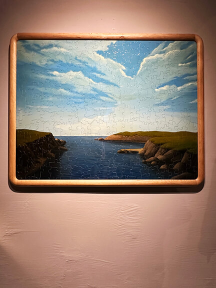 LA interior design showrooms showcase ocean view puzzle art in a custom natural wood BDDW frame at their LA showroom