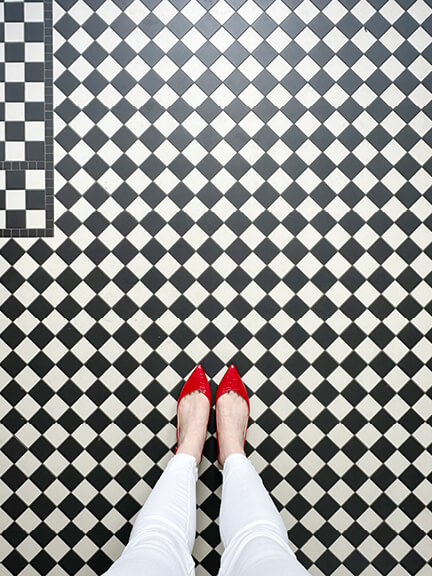 Sarah Flint shoe review with red croc Stella slingbacks on a black and white checkered floor in a New England new build.