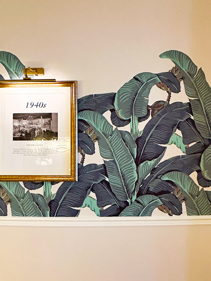 Banana leaf wallpaper in the Beverly Hills Hotel, an iconic interior design feature blending tropical flair with historic Los Angeles style.