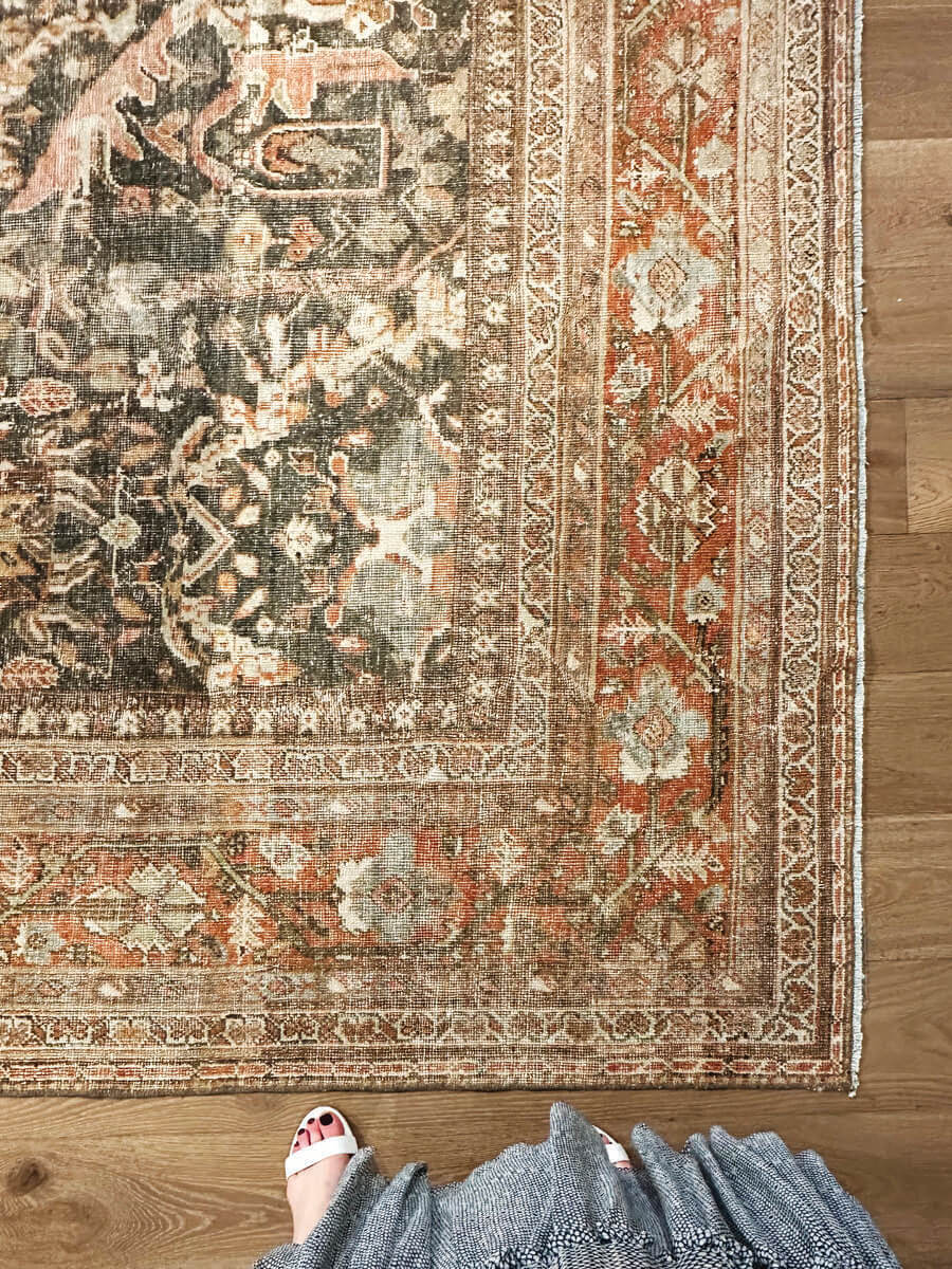 Vintage area rugs by Sarah Scales displayed in the Ben Soleimani LA showroom with elegant styling