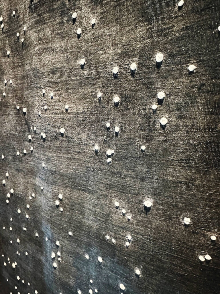 Close‑up of Studio Shamshiri Constellation Rug texture in LA interior design showrooms at Christopher Farr