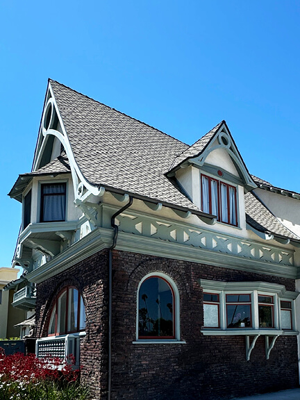 Fitzgerald Residence in West Adams, Los Angeles, features variegated brickwork and classic Colonial Revival architectural details.