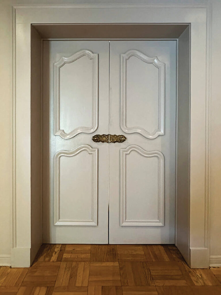 French Baroque style doors in light grey in LA interior design showrooms at Christopher Farr