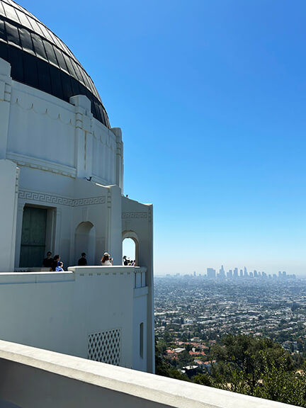 Griffith Observatory offers sweeping views of Los Angeles, framed by historic architecture and its iconic aged copper-clad dome.
