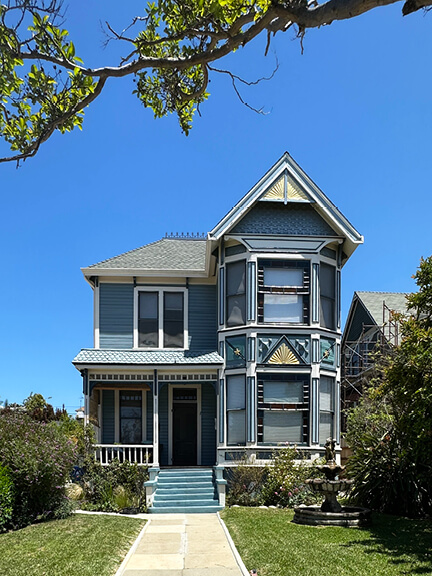 Historic architecture in Los Angeles captured in a detailed Victorian home on Carroll Avenue in Angelino Heights, lined with vintage homes.